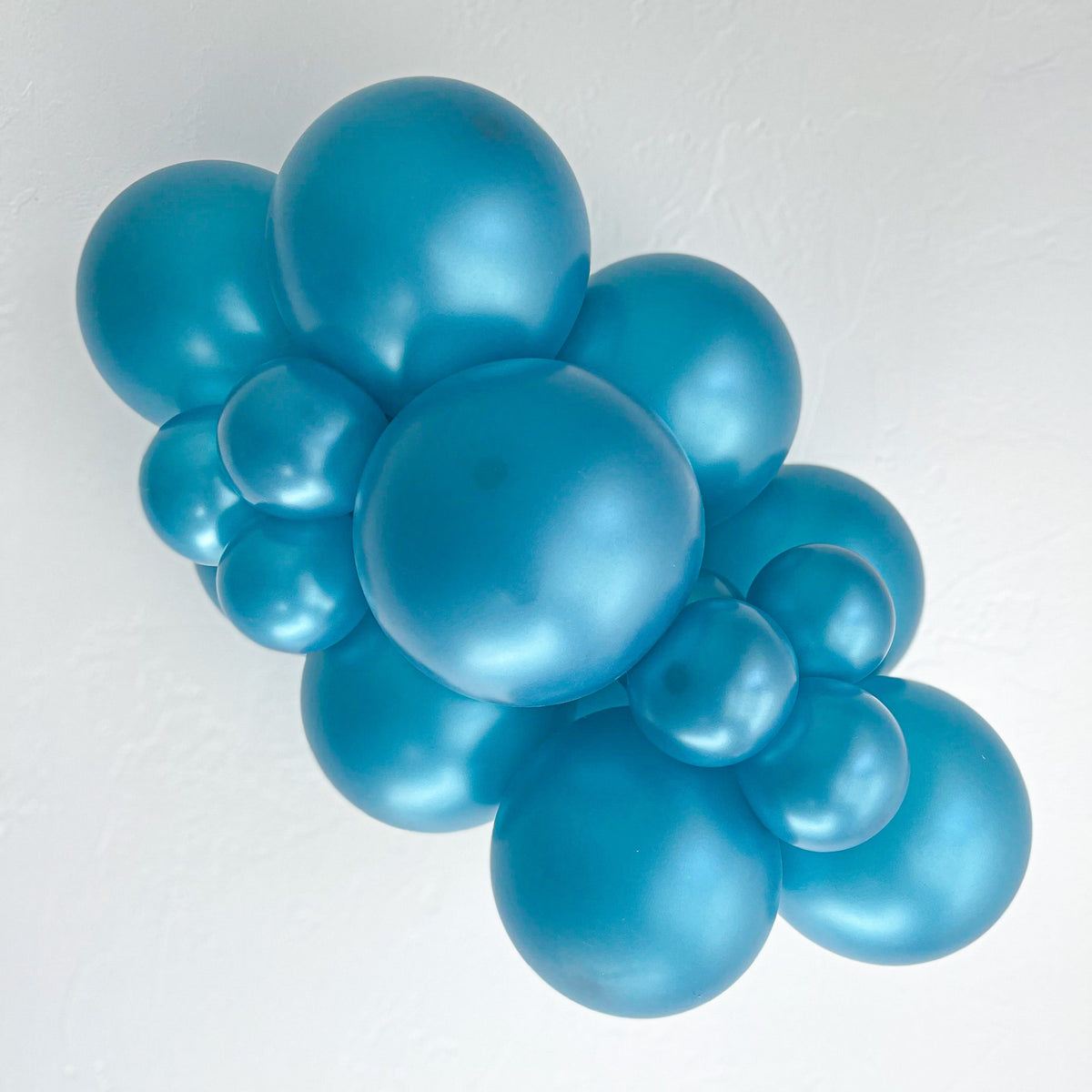 Tuftex_Metallic_Teal_Cluster